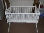 BABY'S WHITE swinging crib in immaculate condition,  sold....